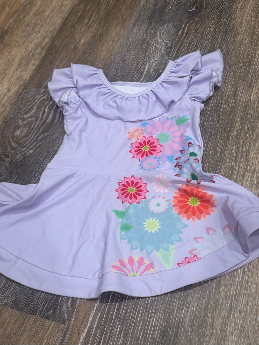 Only Little Once "Flower Sister" Encanto-inspired ruffled swimsuit dress.